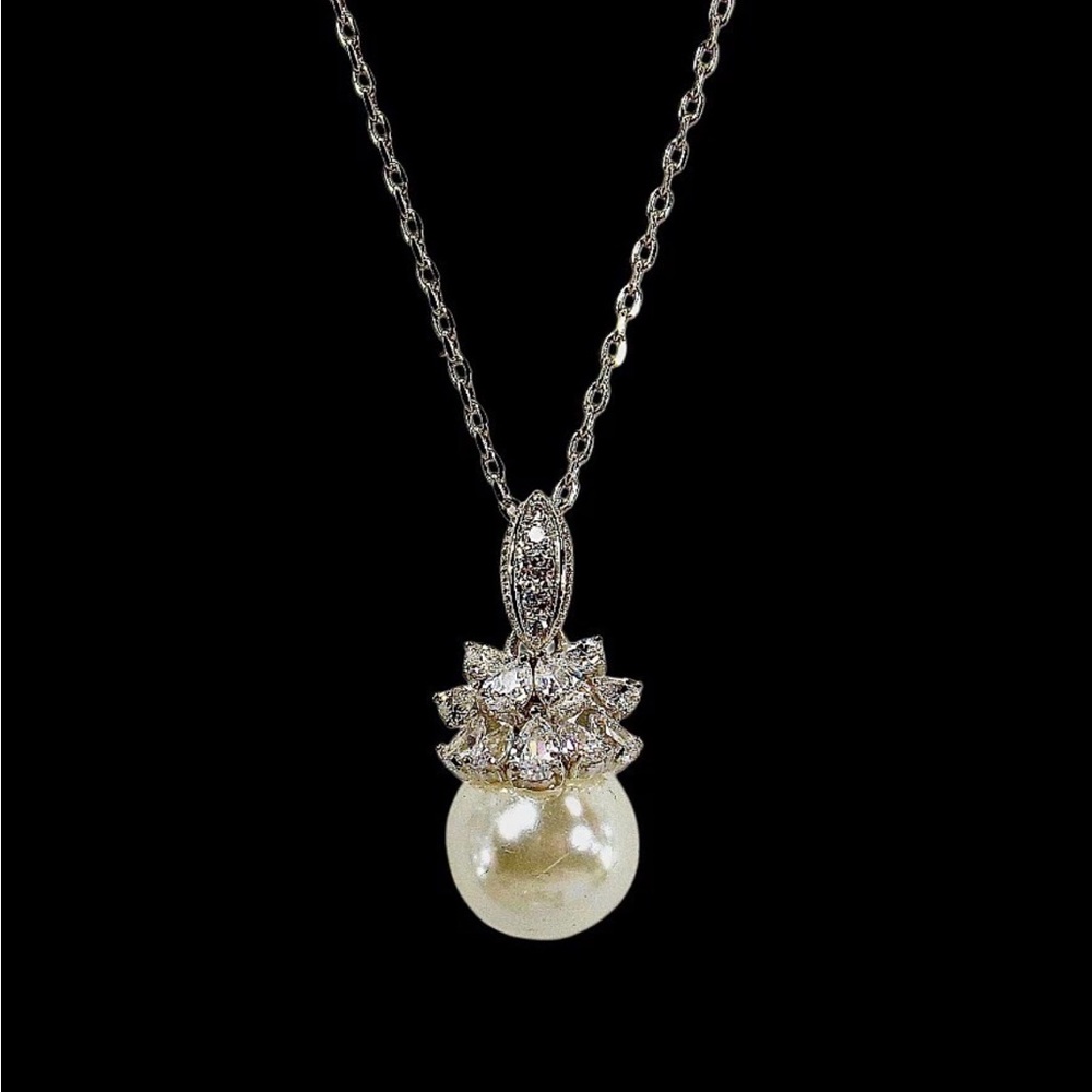 White round pearl pendant necklace with clear crystals set on top New